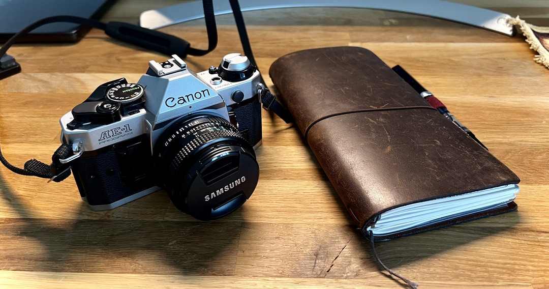 canon ae-1 prorgam and midori notebook